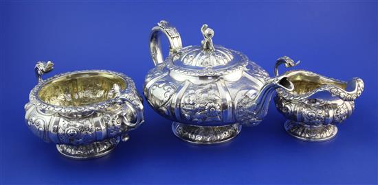 A George IV silver three piece tea set, gross 50 oz.